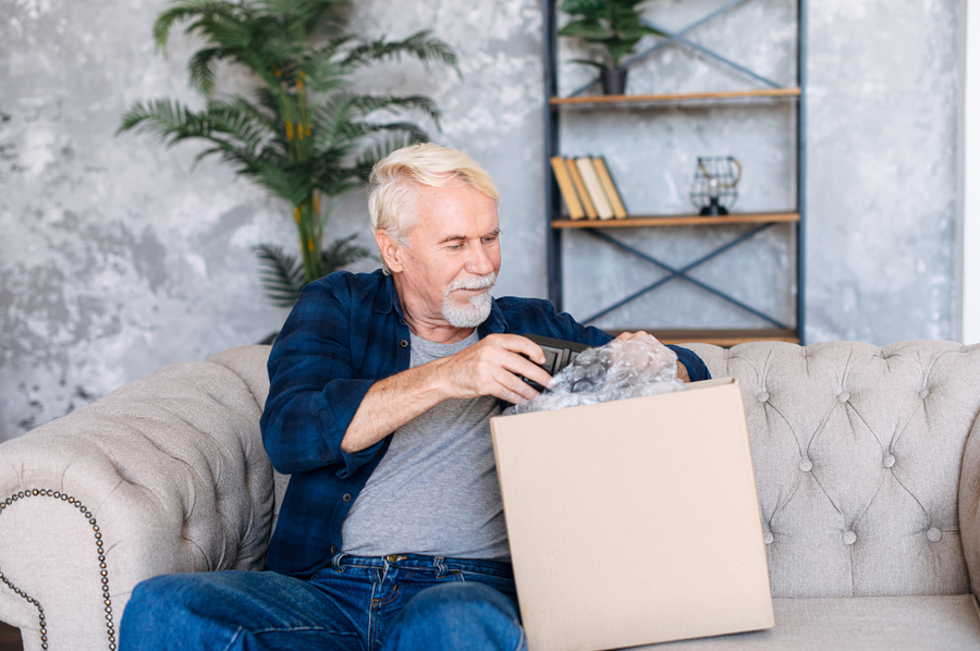 Man opening a box.