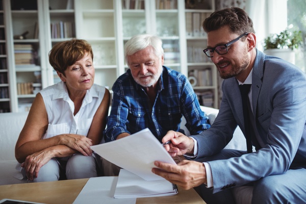 Three people meeting. financial data