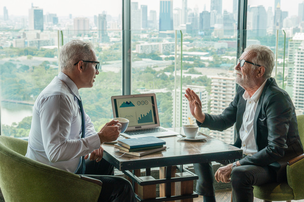 Two men having a discussion. Data strategy