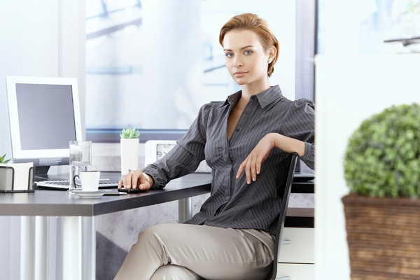 Woman at her desk.