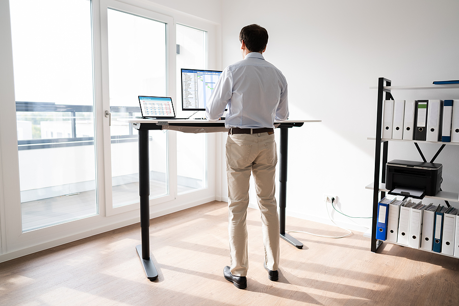 Alternate sitting and standing while working at a computer