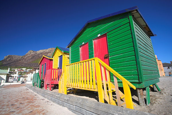 Row of colorful cottages.