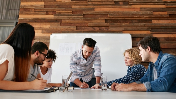 Group of coworkers discussing a project.