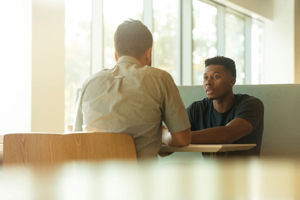 Employer interviewing potential employee.