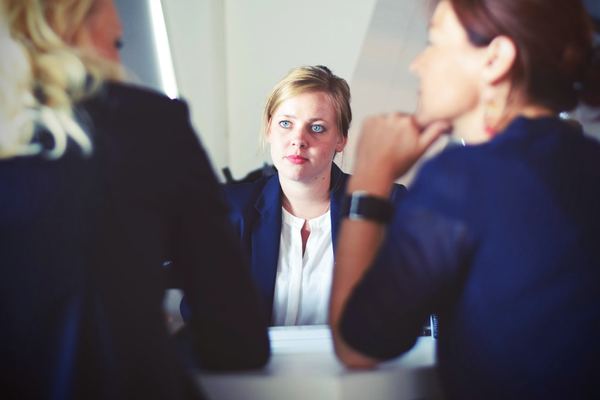 Potential employee being interviewed.