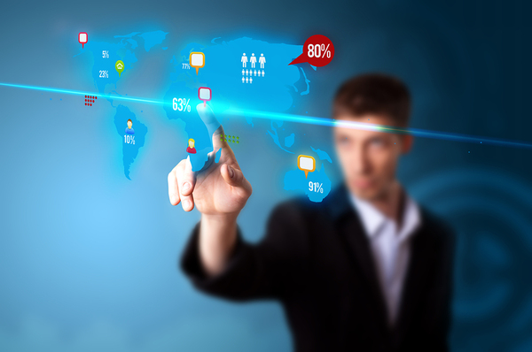 Man pointing to a world map.
