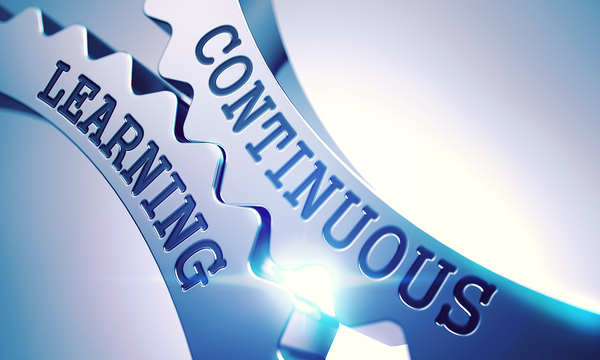 Two gears labeled learning and continuous.