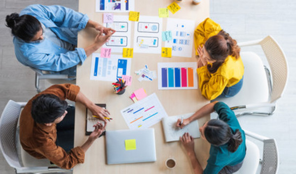 Group working around a table.