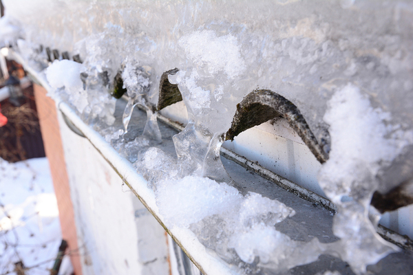 Ice on a roof and in gutters.