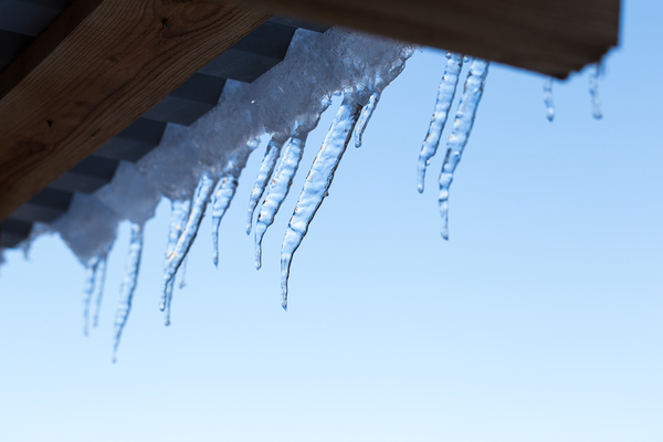 Icicles hanging from roof.
