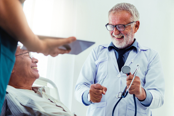 Medical doctor discussing care with a patient.