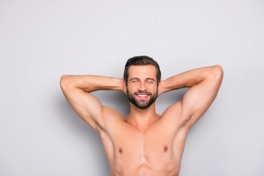 Smiling man with his eyes closed.