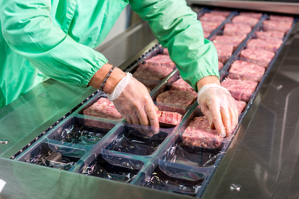 Working packaging meat.