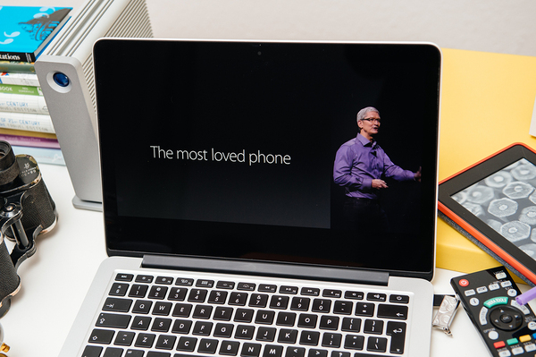 Laptop computer with Tim Cook of Apple on the display.