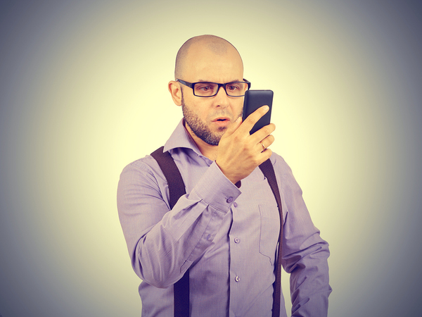 Man looking at his smartphone.