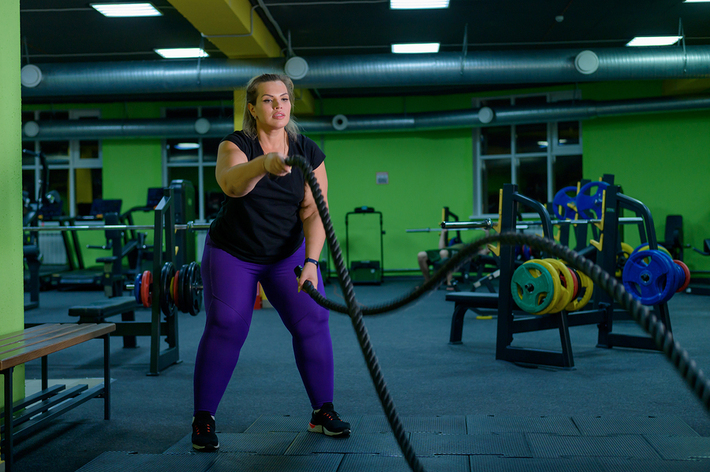 Woman working out in a gym.