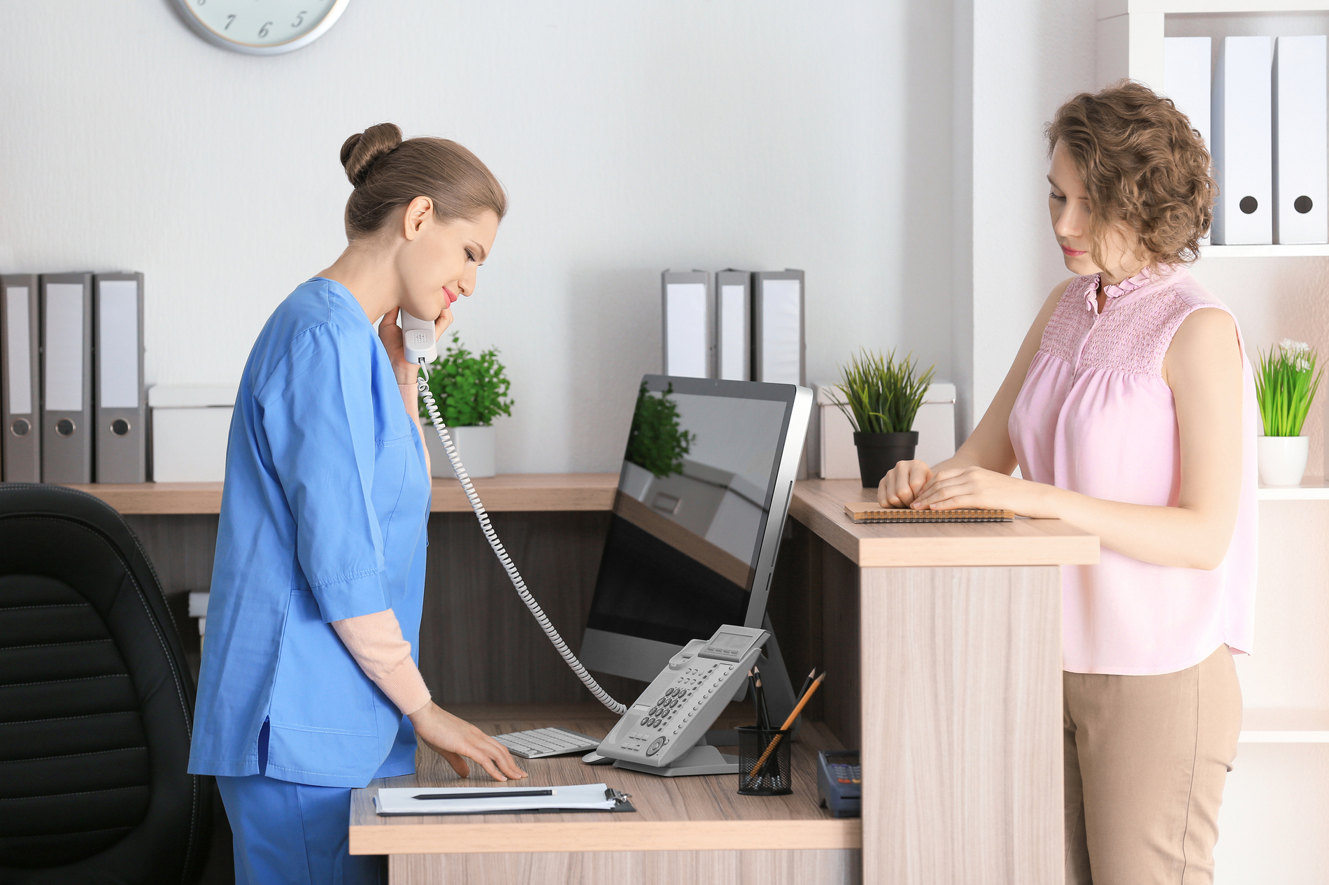 Patient checking in to a medical facility.