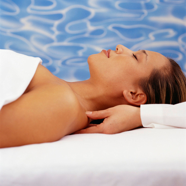 Woman lying down having a massage.